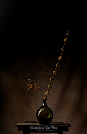 Bottled flowers spill